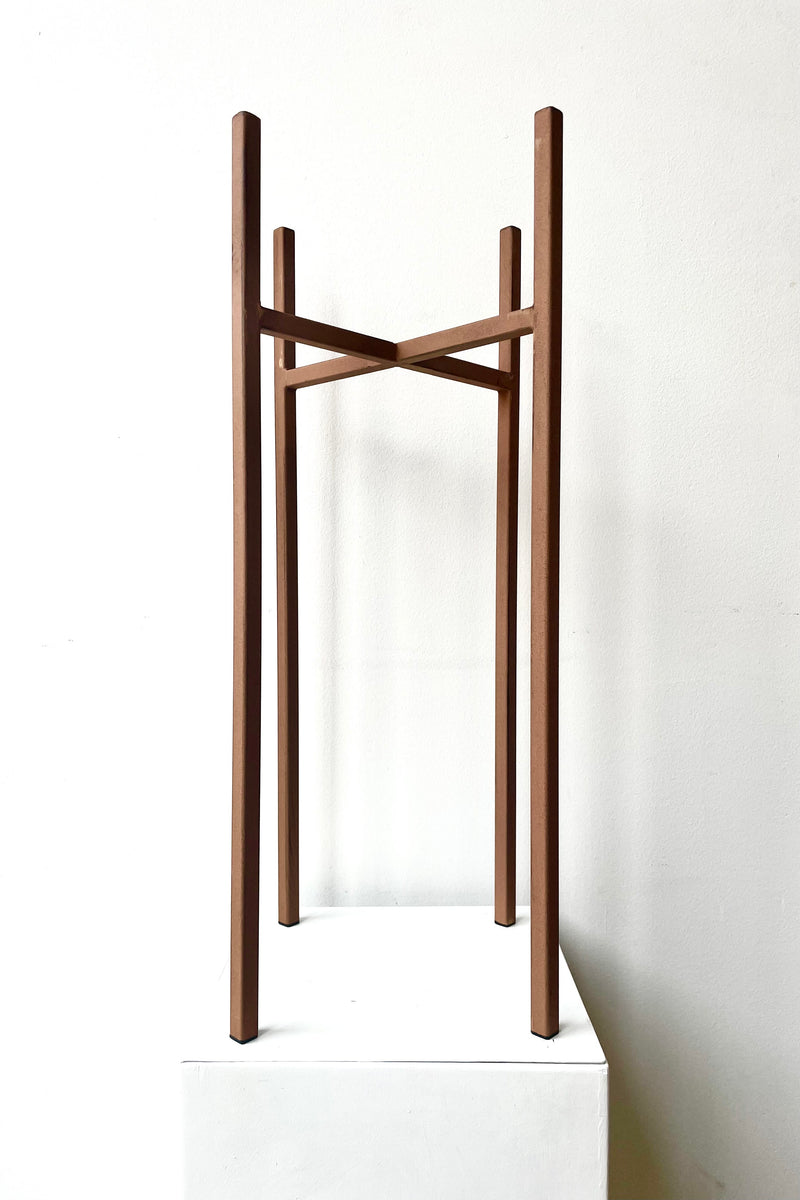 Ascot Plant Stand, Rust 9.45" against a white wall