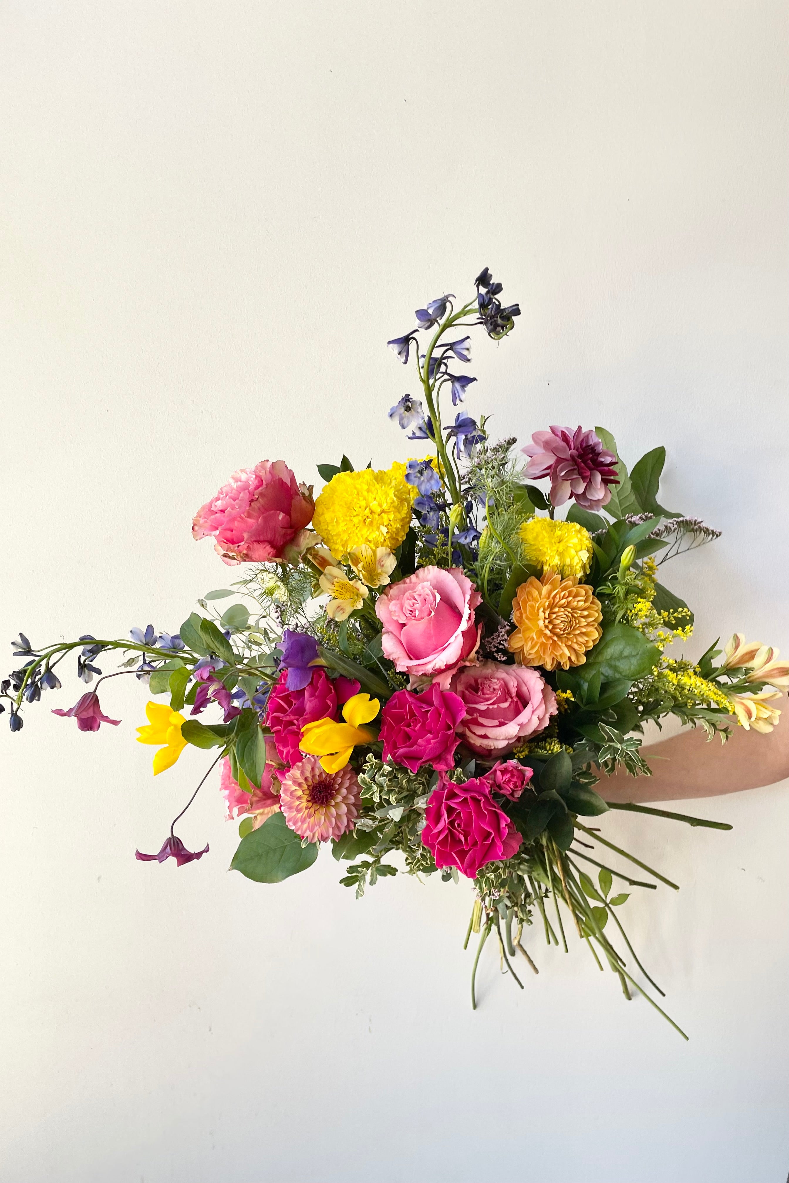 Bright and multi colored floral arrangement 'Midday' created by Sprout Home for delivery or pick up.  #size_$200