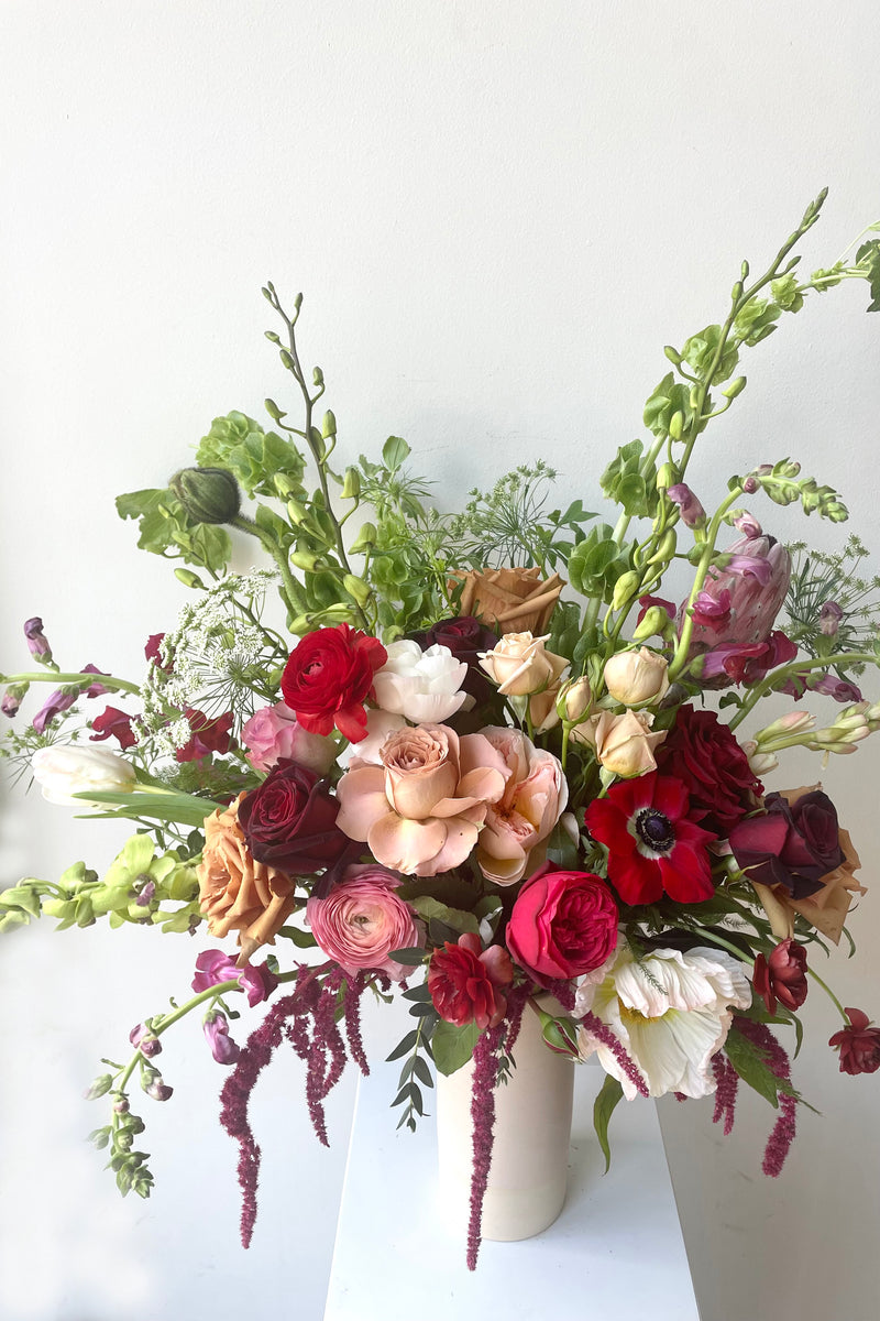 A vase holds an example of fresh Floral Arrangement Modern Love $200 from Sprout Home Floral in Chicago for Valentine's Day