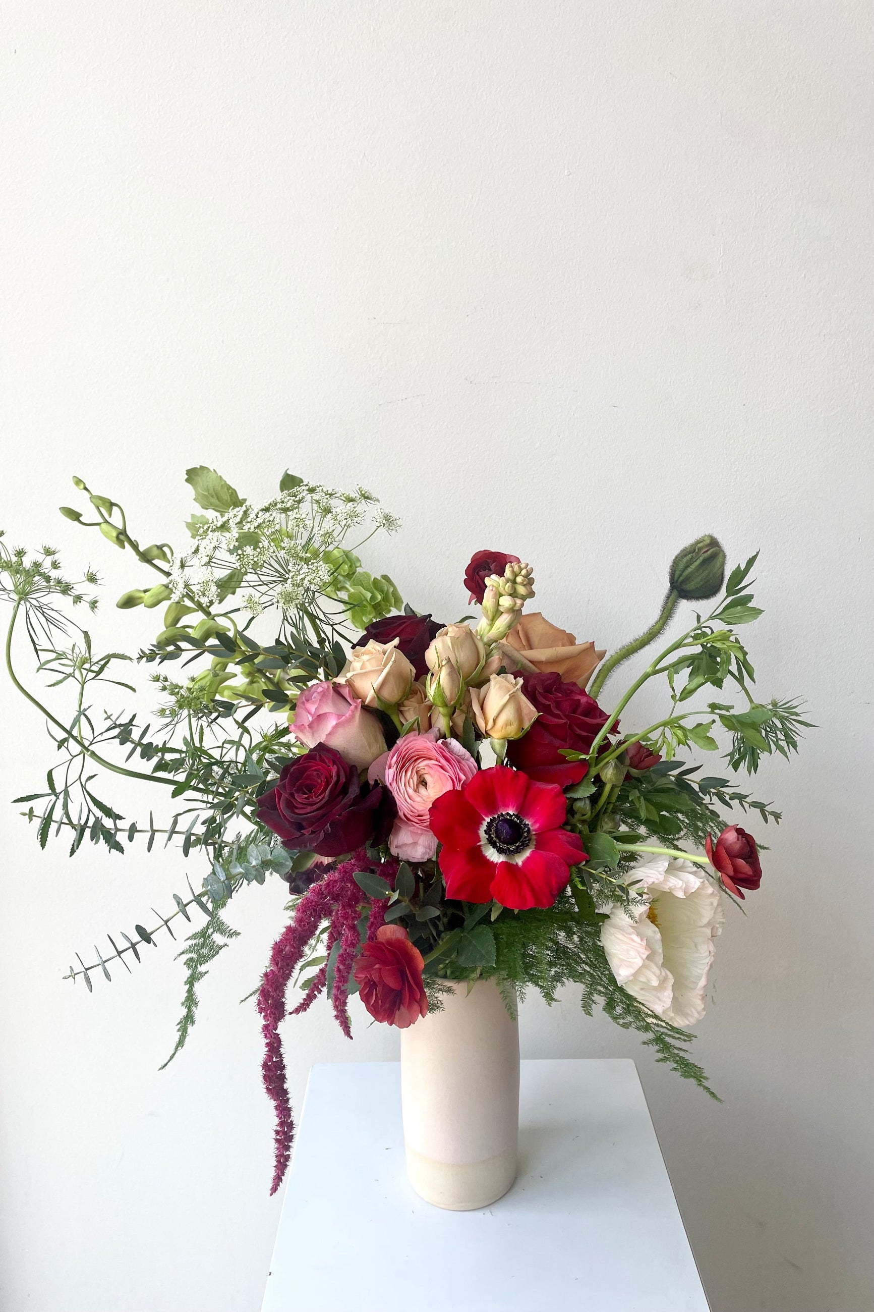 A vase holds an example of fresh Floral Arrangement Modern Love from Sprout Home Floral in Chicago for Valentine's Day ©Sprout Home #size_$100