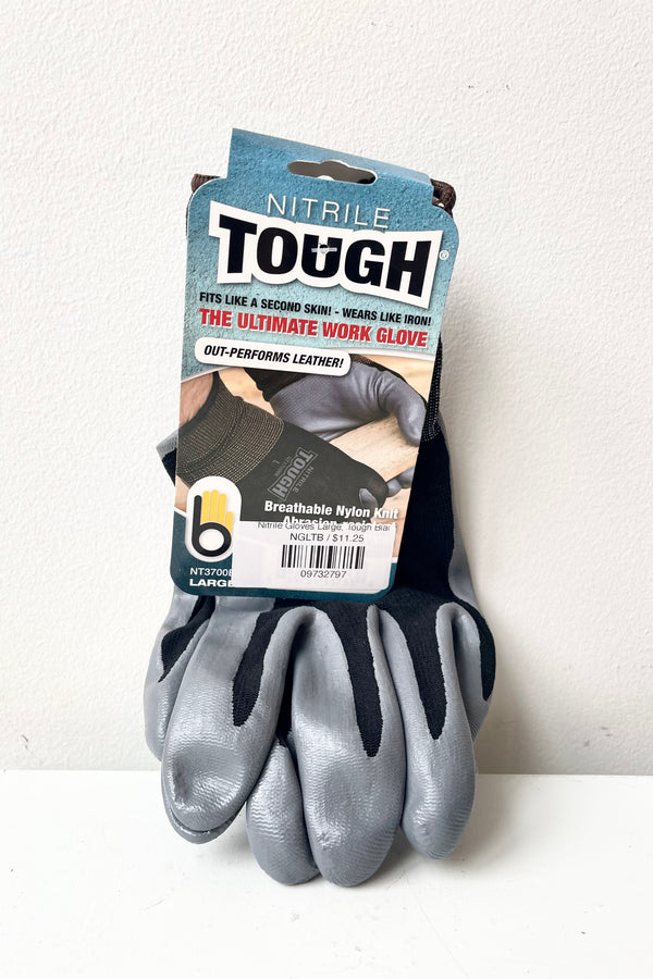 Nitrile Gloves Tough Black Large against a white wall