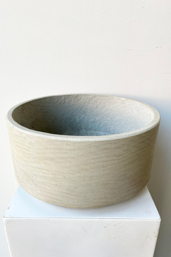 the grey washed Eli pot showing a little bit of the interior against a white wall at Sprout Home.