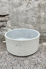 Detail of the top of Eli Bowl grey washed large against a grey wall