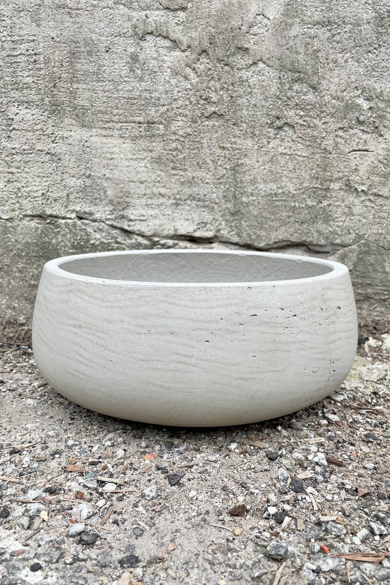 Eileen Pot grey washed medium against a grey wall