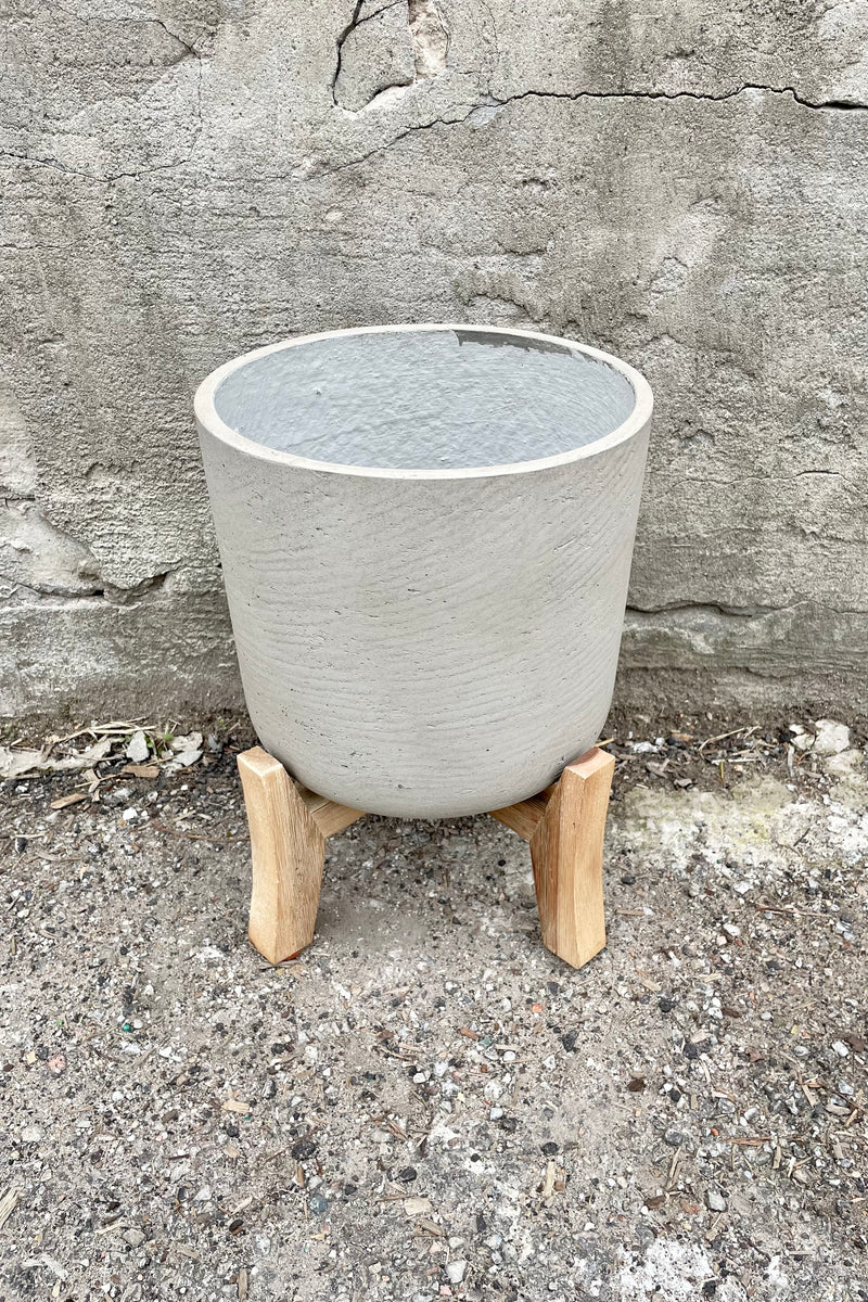 Detail of the top of the Charlie Pot & low stand grey washed large against a grey wall