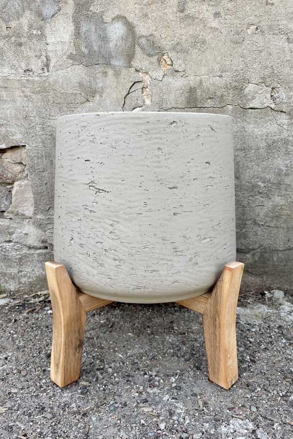 Patt Pot w/ Low Feet Grey Washed Extra Extra Large against a grey wall