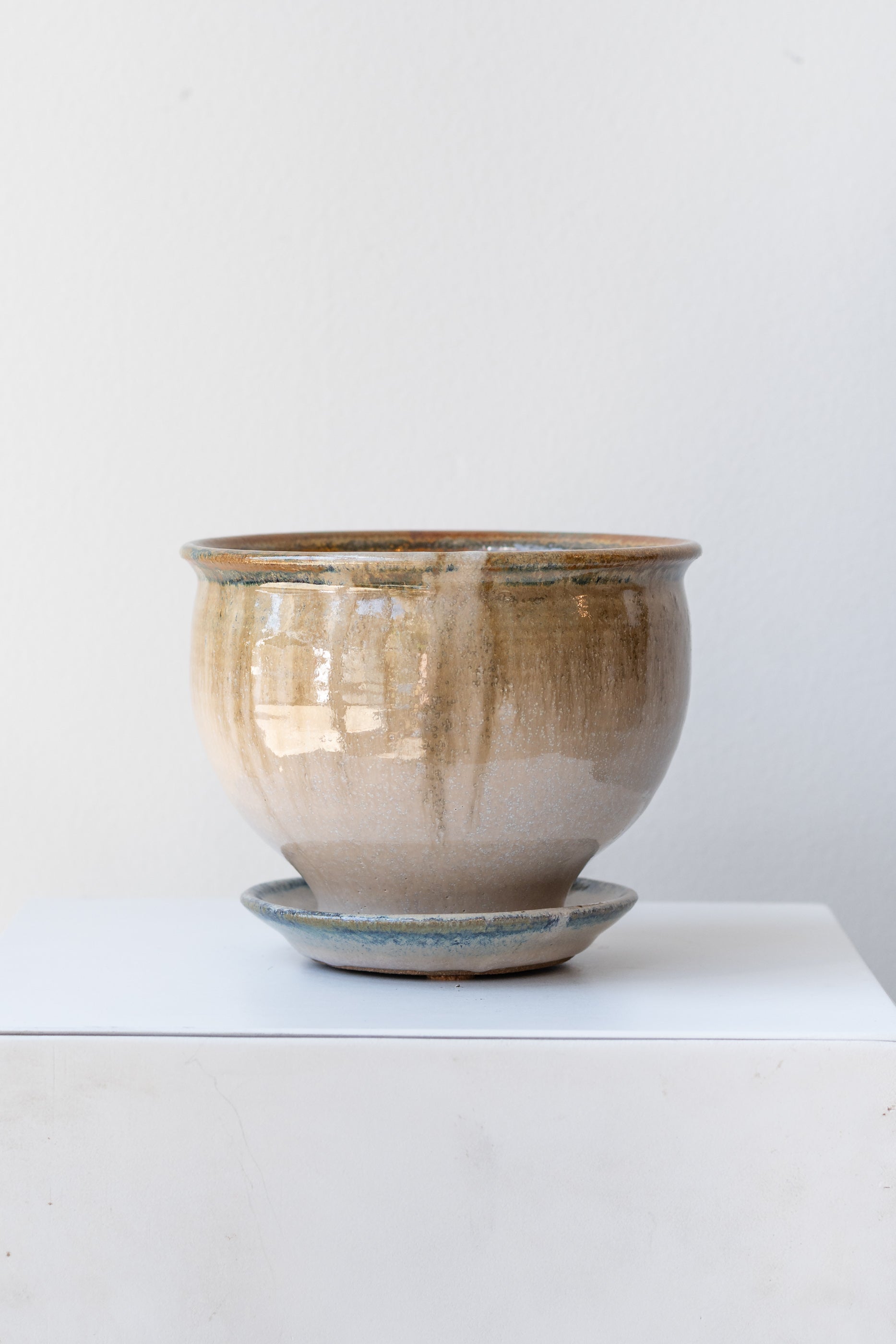 Bruning Pottery Planter ivory & iron glaze - 4" on white surface in a white room