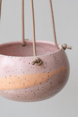 Close up of Miami Pink Orb Hanging Planter, rose quartz & apricot glaze detail