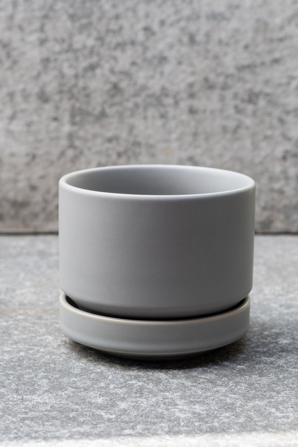 Grey stoneware planter with matching saucer by LBE Designs