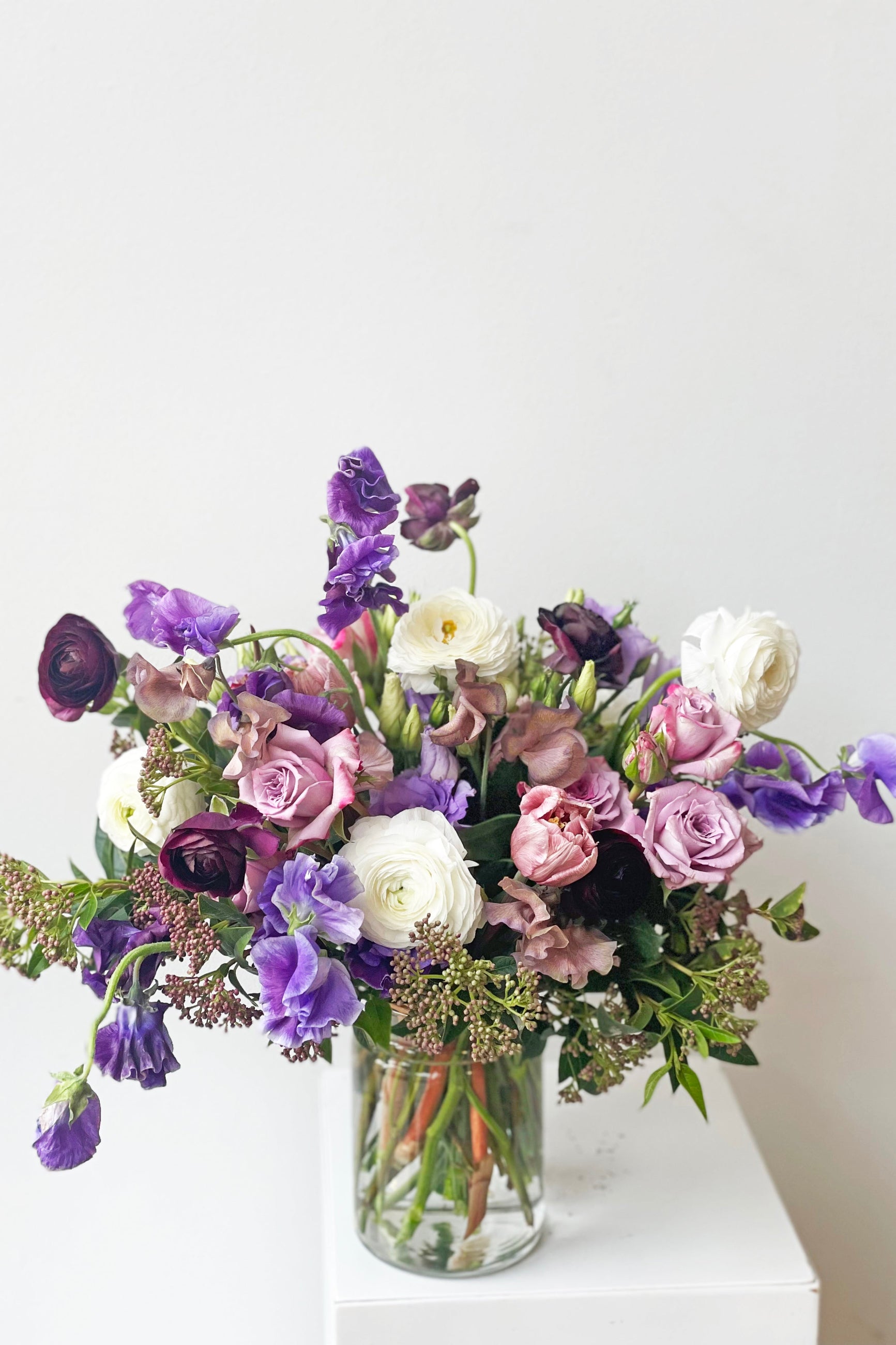 An example of Floral Arrangement Storm option with purple sweet pea from Sprout Home in Chicago ©Sprout Home #size_$160