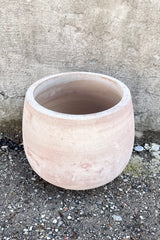 Detail of Yumiko Unglazed Planter Small against a grey wall