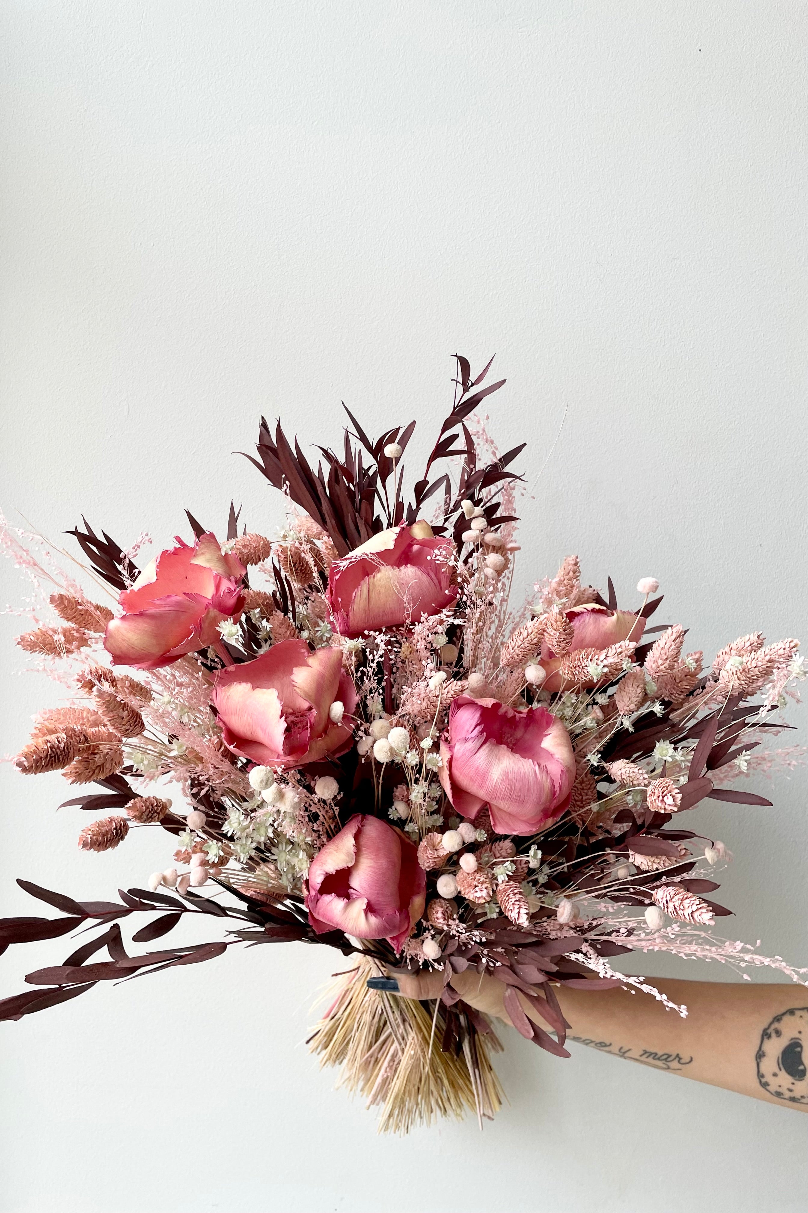 Sprout Home's Chocoberry Milkshake arrangement against a white wall. #size_$200