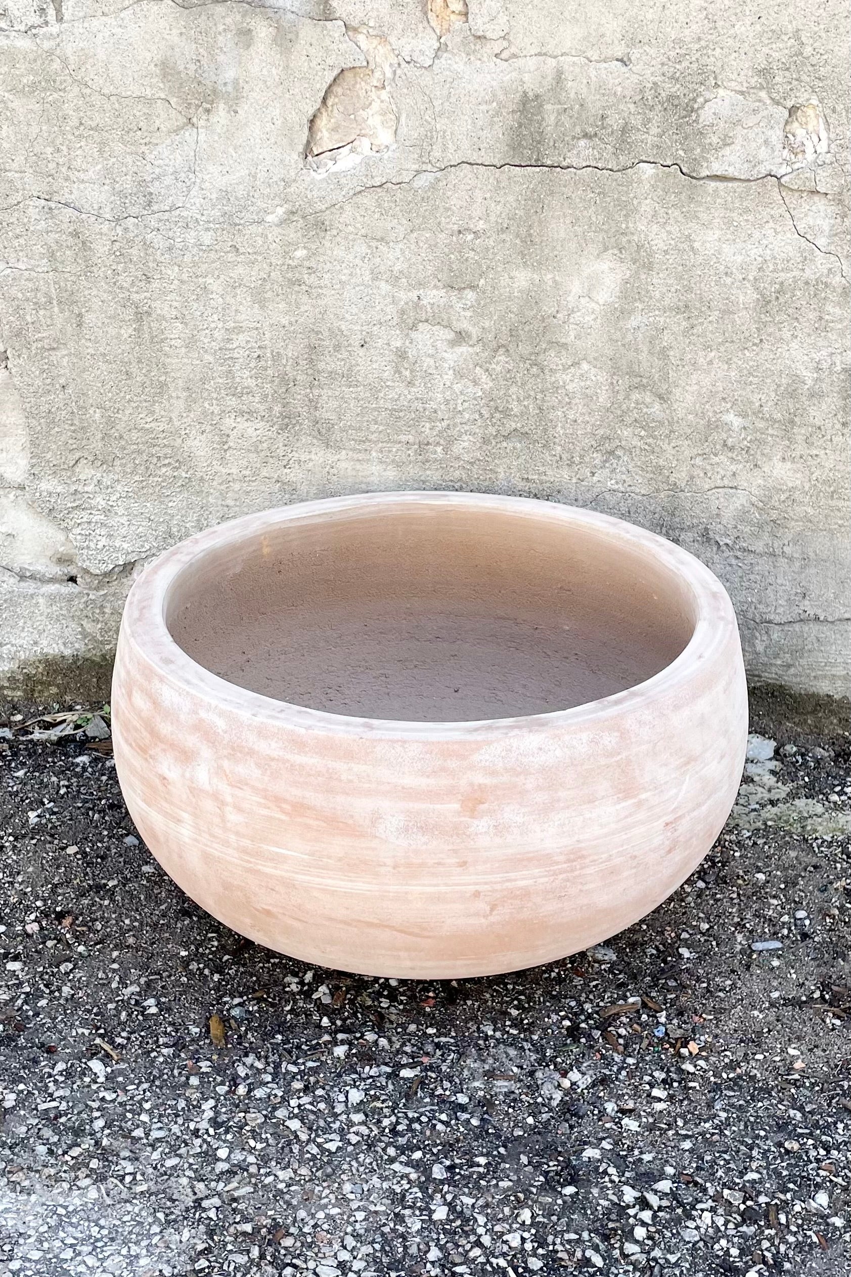 Detail of Yumiko Unglazed Bowl Large against a grey wall