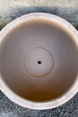 Detail of the inside of the Yumiko Unglazed Bowl Large against a grey wall