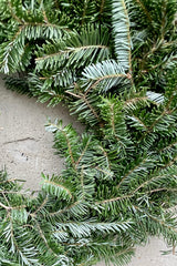 Detail image of the blue green needles of the Fraser wreath.